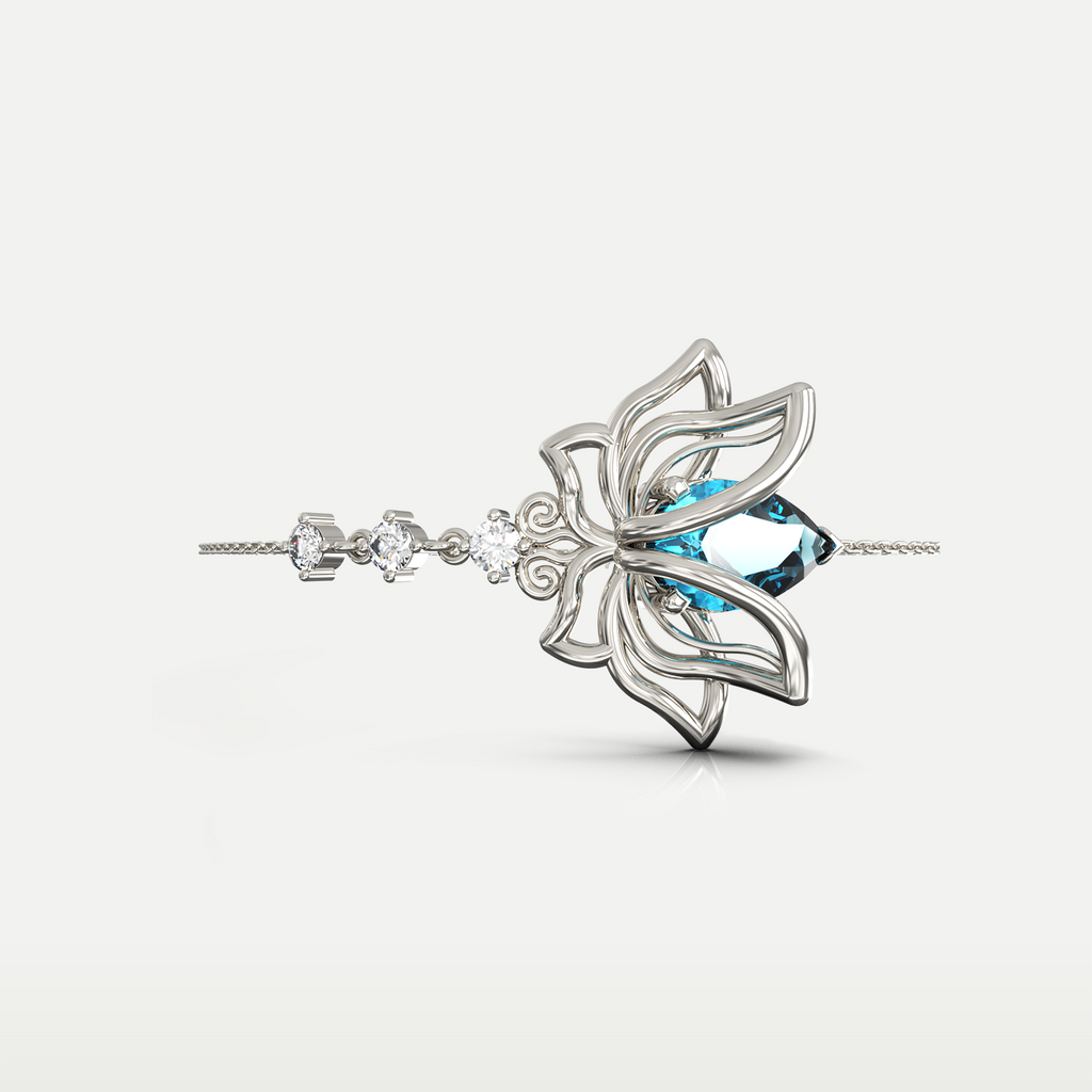Blue Topaz Lotus Bracelet in 925 sterling silver, top view of the openwork lotus flower with a blue topaz center on a fine chain bracelet