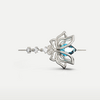 Blue Topaz Lotus Bracelet in 925 sterling silver, top view of the openwork lotus flower with a blue topaz center on a fine chain bracelet