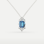 Blue Topaz Art Deco Hexagon Pendant in 925 sterling silver, front view of the emerald-cut blue topaz with diamond-style accents on a chain
