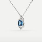 Blue Topaz Art Deco Hexagon Pendant in 925 sterling silver, angled side view of the emerald-cut blue topaz