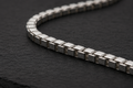 Close-up of polished 925 sterling silver box chain necklace links