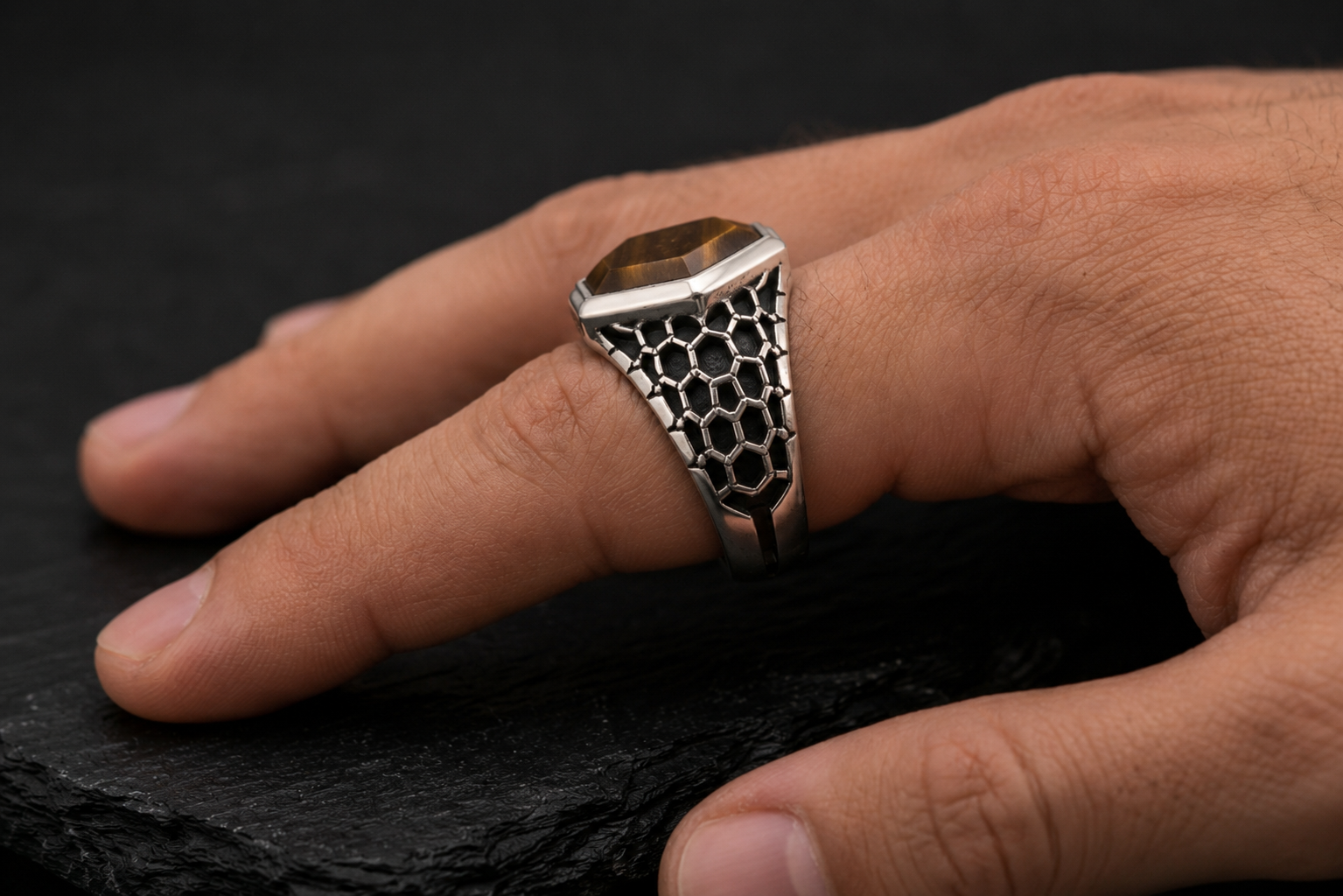 Hex Armor Ring with natural tiger eye in 925 sterling silver - lifestyle view on hand