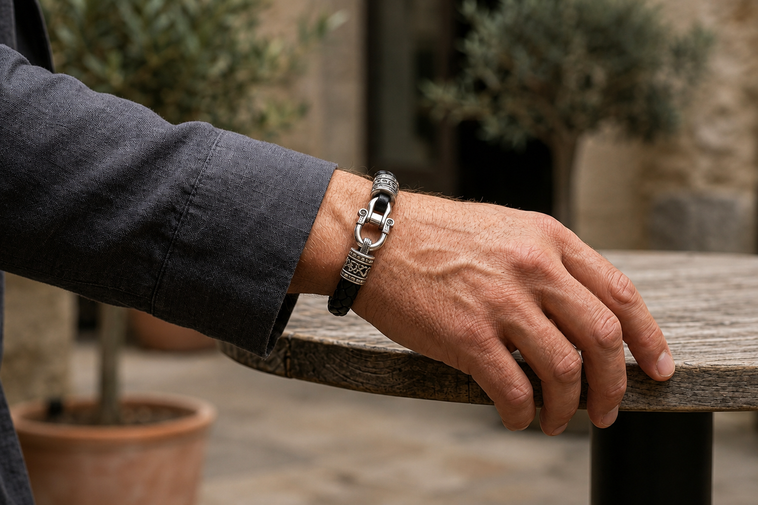 Praise Jewels leather and sterling silver men's bracelet worn on wrist
