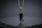 Praise Jewels Spear Pendant with natural black onyx worn by a man