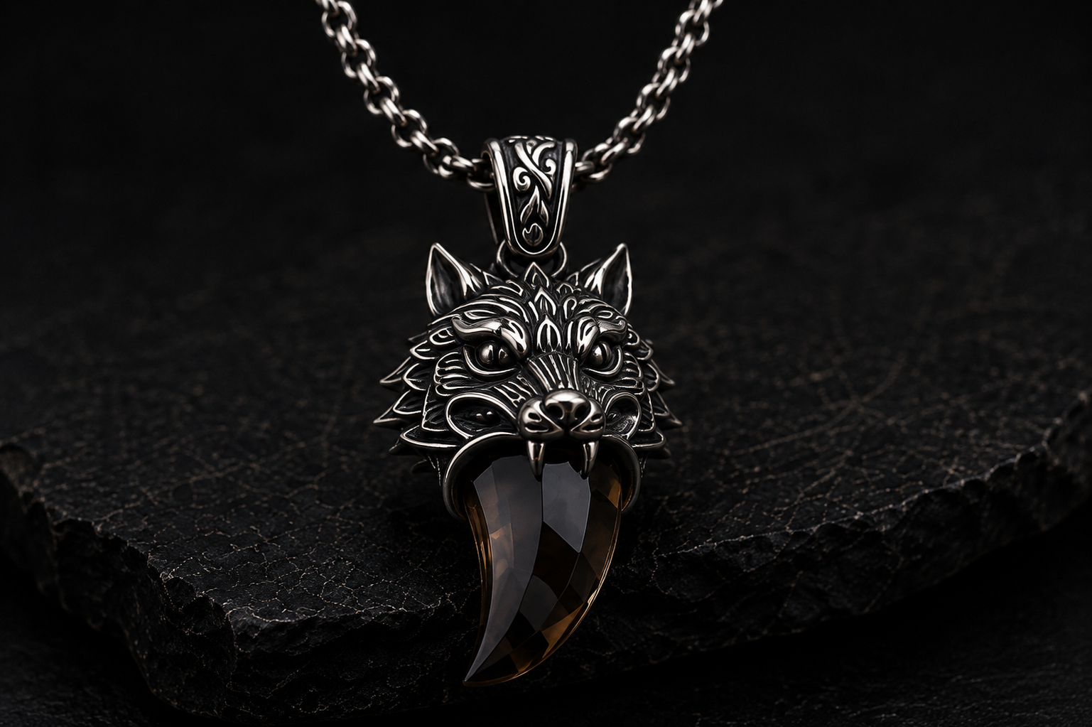 Close-up detail of Praise Jewels Wolf Tooth Pendant and smoky quartz gemstone