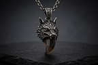 Front view of Praise Jewels Wolf Tooth Pendant with natural smoky quartz