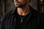 Praise Jewels Wolf Tooth Pendant with smoky quartz worn by a man