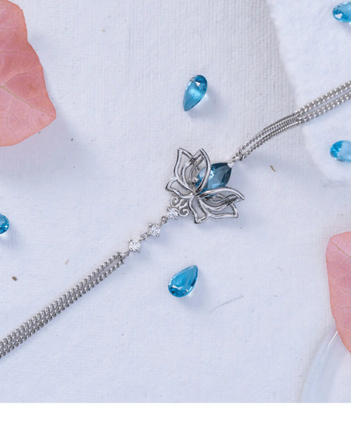 Blue Topaz Lotus Bracelet in 925 sterling silver, close-up detail of the clasp and links on the wrist
