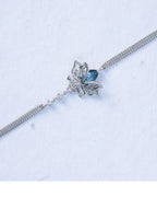 Blue Topaz Lotus Bracelet in 925 sterling silver, front view worn on the wrist
