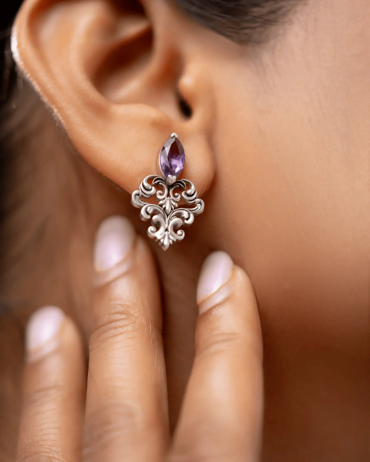 Amethyst Filigree Earrings in 925 sterling silver, close-up detail from the earlobe