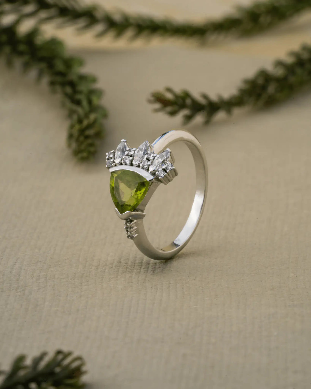 Peridot Bloom Ring in 925 sterling silver, close-up detail showing the band and stone