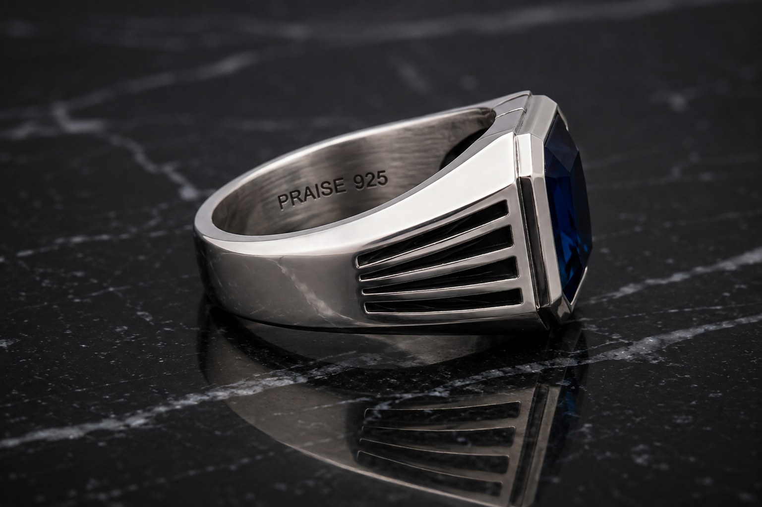 Royal Crest Ring side view in 925 sterling silver with London Blue Topaz
